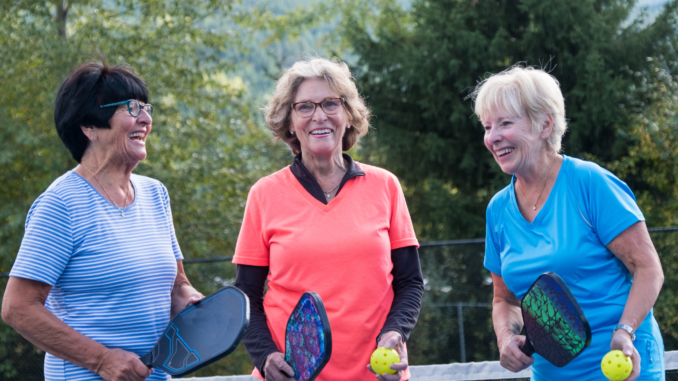 Seniors playing pickleball